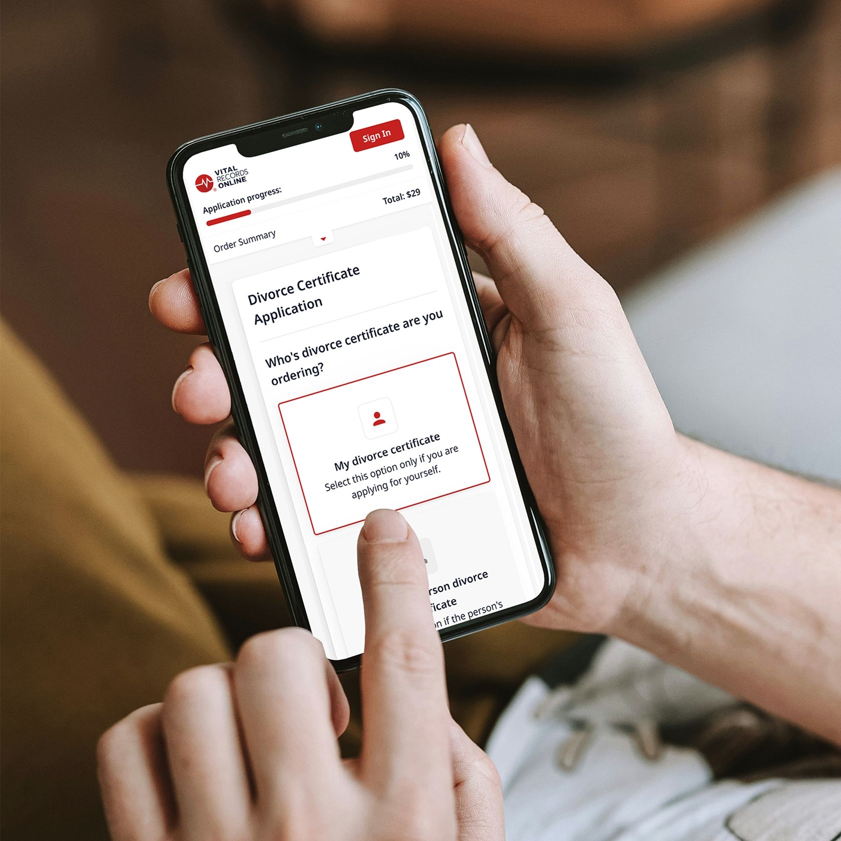 Person ordering a divorce certificate with a phone using VRO