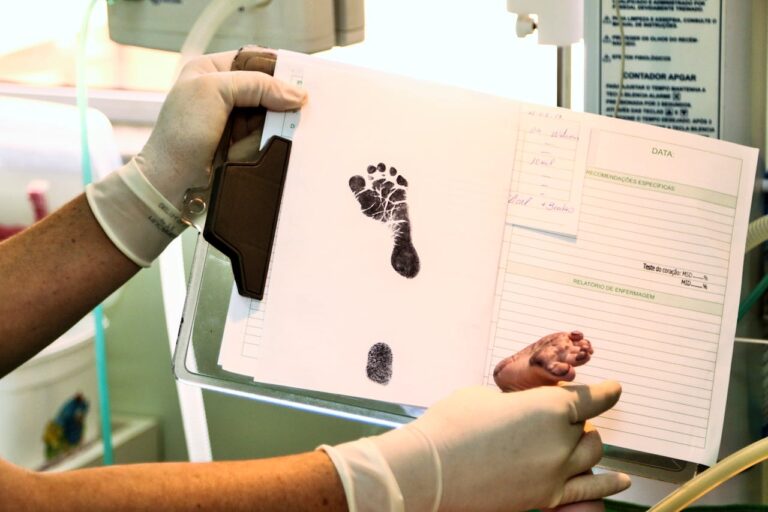 A baby’s foot stamped on a certificate